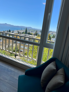 Alojamiento en el centro con vista parcial al lago y con cochera